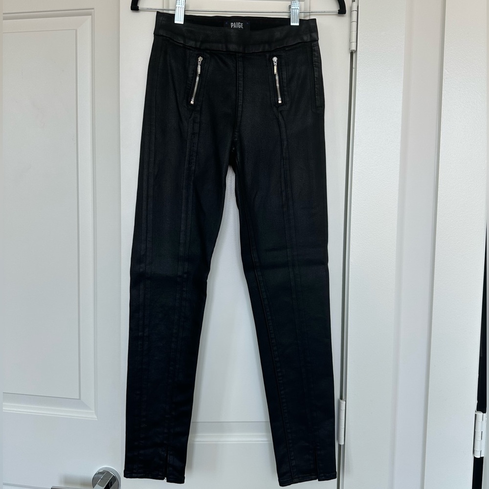 Paige black wax coated skinny denim pant with ankle slit and silver hardware